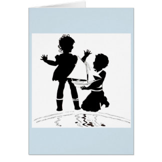 silhouette of girl and boy and model boat