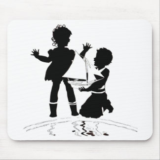 silhouette of girl and boy and model boat mouse pad