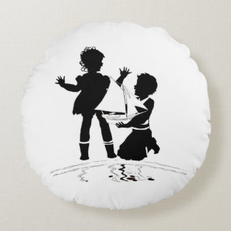 silhouette of girl and boy and model boat round pillow