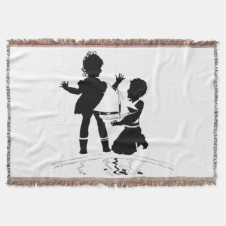 silhouette of girl and boy and model boat throw blanket