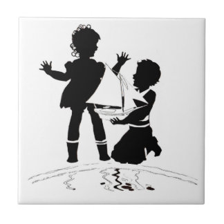 silhouette of girl and boy and model boat tile