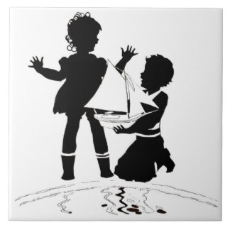silhouette of girl and boy and model boat tile
