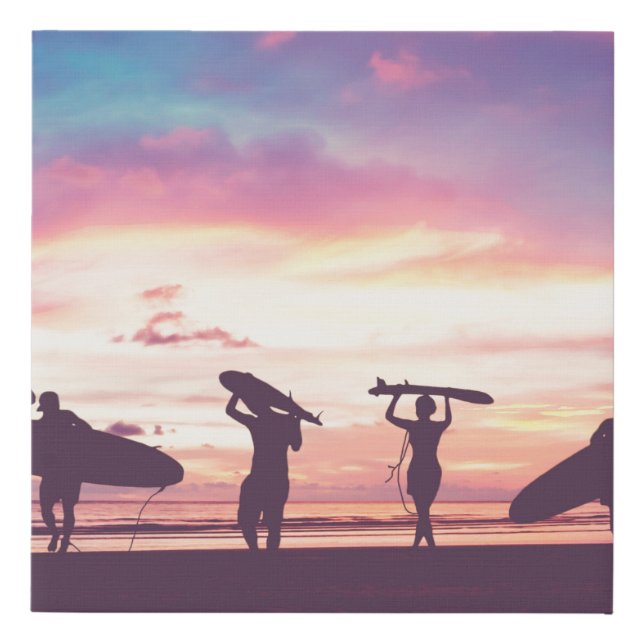 Silhouette Of surfer people carrying their surfboa Faux Canvas Print (Front)