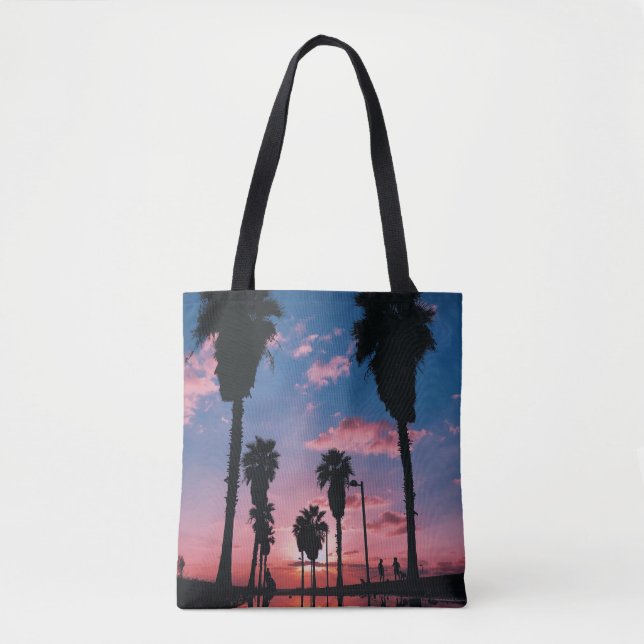 Silhouette of tree under cloudy sky tote bag (Front)
