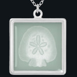Silhouette Sand Dollar Silver Plated Necklace<br><div class="desc">Can you imagine living your life on the beach? Get this beautiful image of this silhouette sand dollar to add to your beach collection. This unique translucent piece of art work is great on any of your Zazzle products. It's contemporary and modern art will make you the most stylish among...</div>