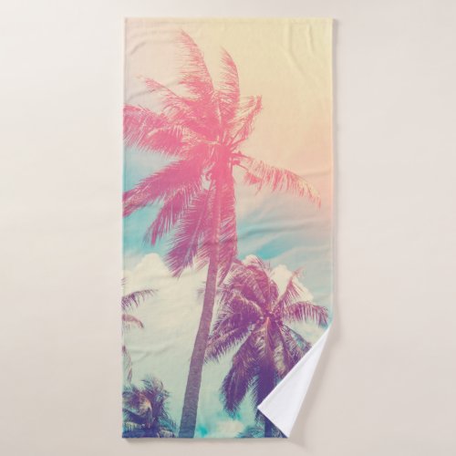 Silhouette tropical palm tree with sun light on su bath towel