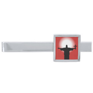 Silhouette with a cross silver finish tie clip
