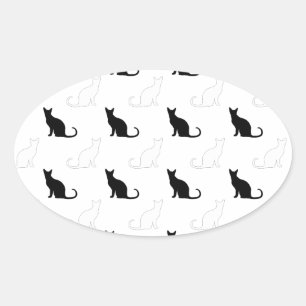 Silhouettes Of Black and White Cats Oval Sticker