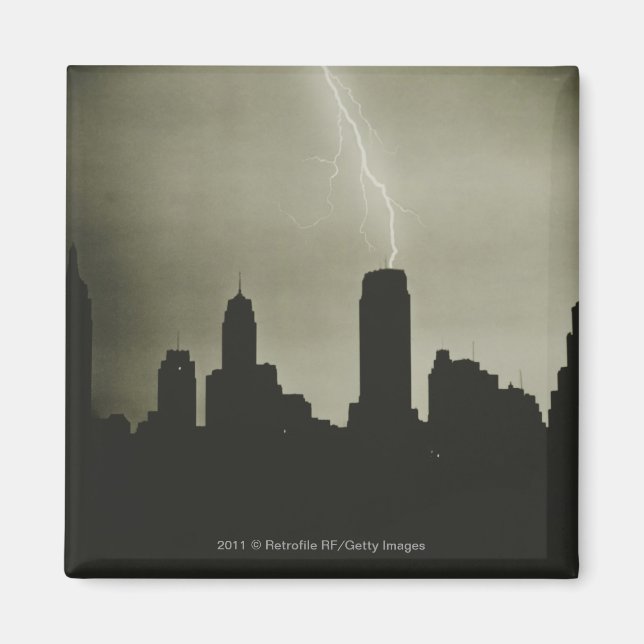 Silhouettes of skyscrapers and lightning in sky magnet (Front)