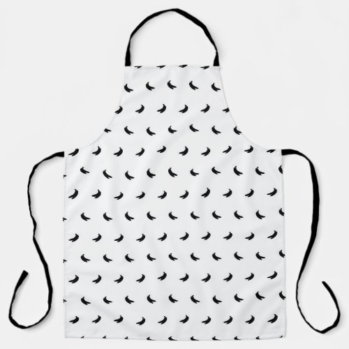 Silhouettes of Small Black Bananas on White Apron