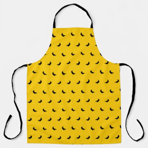 Silhouettes of Small Black Bananas on Yellow Apron