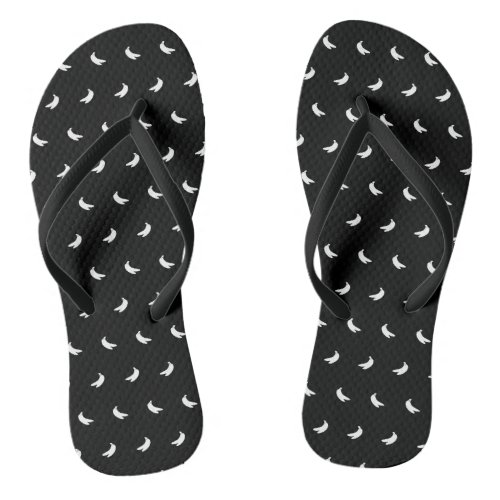 Silhouettes of Small White Bananas on Black Flip Flops