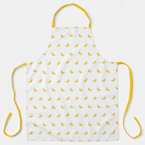 Silhouettes of Small White Bananas on Yellow Apron