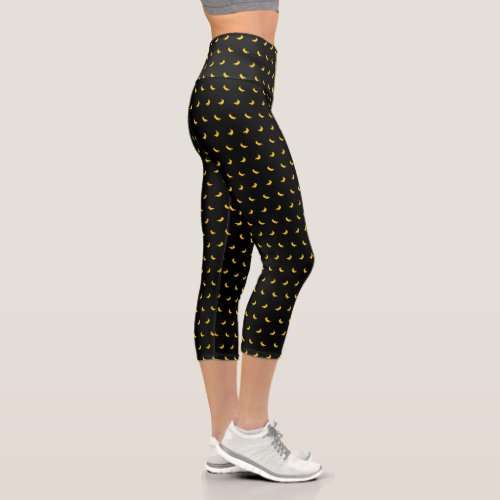 Silhouettes of Small Yellow Bananas on Black Capri Leggings