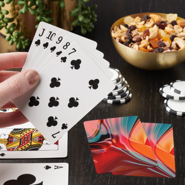 Silky satin red shades twisted reflecting lighting poker cards (In Situ)