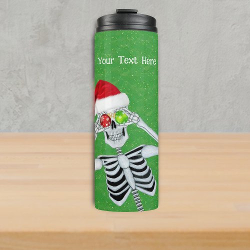 Silly Christmas Skeleton Ornament Eyes Green Gold Thermal Tumbler