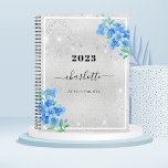 Silver blue floral name appointment 2024 planner<br><div class="desc">A faux silver metallic looking background,  with blue forget-me-not florals,  flowers. Faux glitter dust. Personalize and add a year,  name and title.</div>