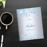 Silver blue glitter name monogram 2024 planner<br><div class="desc">A faux silver metallic looking background decorated with blue faux glitter dust. Personalize and add your first name,  monogram initials,  full name and a year.</div>