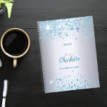 Silver blue glitter name monogram 2025 planner<br><div class="desc">A faux silver metallic looking background decorated with blue faux glitter dust. Personalize and add your first name,  monogram initials,  full name and a year.</div>