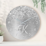 Silver Brushed Metal Glitter Monogram Name Round Clock<br><div class="desc">Easily personalize this trendy round clock design featuring pretty silver sparkling glitter on a silver brushed metallic background.</div>