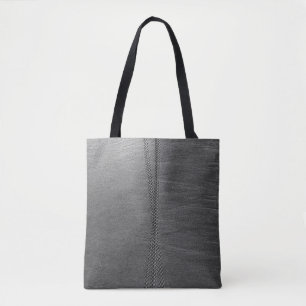 Silver chain link on gray textile tote bag
