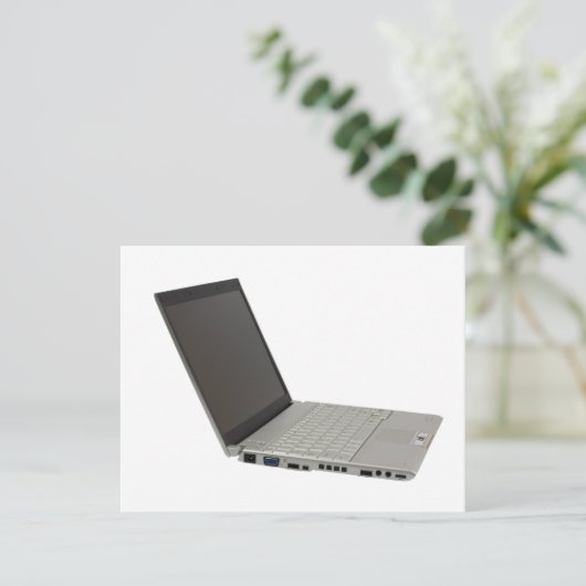 Silver colored laptop (Standing Front)