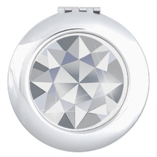 Silver compact mirror with diamond cut pattern