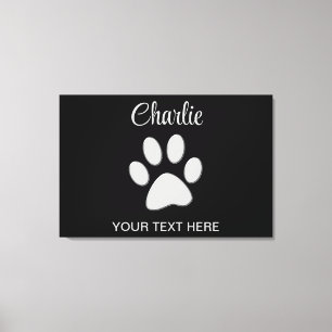 Silver Dog Paw on black background Canvas Print
