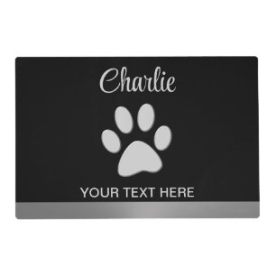 Silver Dog Paw on black background Placemat
