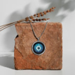 Silver Evil Eye Necklace - Symbol of Protection<br><div class="desc">Our evil eye necklace is perfect for those seeking a unique blend of fashion and spirituality. Made with love and attention to detail, this jewelry piece is suitable for everyday wear or special occasions. Embrace the ancient symbolism of the evil eye and its protective qualities with this stunning silver necklace....</div>