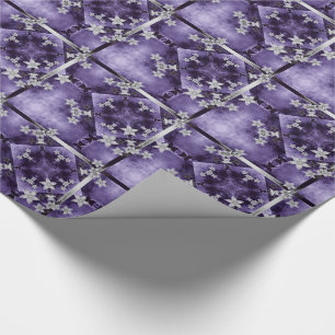 Silver flowers on purple and black wrapping paper