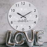 Silver glitter dust metal name script large clock<br><div class="desc">A faux silver metallic looking background,  decorated with faux glitter dust.  Personalize and add your name written with a trendy hand lettered style script with swashes.
To keep the swashes only delete the sample name,  leave the spaces or emoji's in front and after the name.</div>