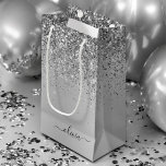 Silver Glitter Sparkle Metal Monogram Name Small Gift Bag<br><div class="desc">Silver Faux Foil Metallic Sparkle Glitter Brushed Metal Monogram Name Gift Bag. This makes the perfect sweet 16 birthday,  wedding,  bridal shower,  anniversary,  baby shower or bachelorette party gift bag for someone that loves glam luxury and chic styles.</div>