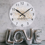 Silver gold glitter name script round clock<br><div class="desc">A faux silver metallic looking background,  decorated with faux gold glitter dust.  Personalize and add your name written with a trendy hand lettered style script with swashes.
To keep the swashes only delete the sample name,  leave the spaces or emoji's in front and after the name.</div>