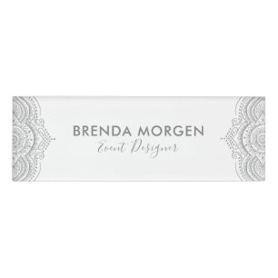 Silver-gray ornate paisley on white name tag