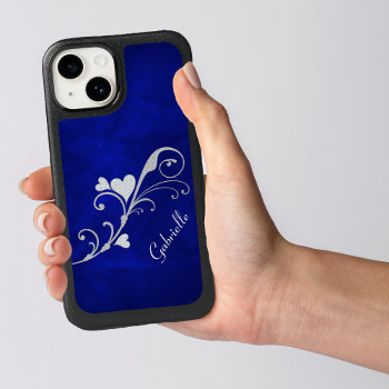 Silver Heart Swirl On Blue Otterbox Iphone 14 Case by MegaCase at Zazzle