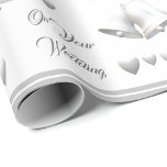 Silver Hearts & Bells Wedding Wrapping Paper<br><div class="desc">Gorgeous Silver Hearts & Bells Wedding wrapping paper design features the image of silver wedding bells and ribbons with silver hearts patterned against a white background. Customizable text reads, "On Your Wedding" and is displayed in an elegant silver font. A silver and white lining is featured at edges of design....</div>