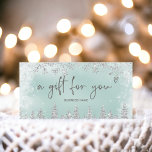 Silver ice blue snow pine logo gift certificate<br><div class="desc">Modern logo gift certificate with this luxury silver glitter snowflakes sparkles and silver glitter pine tree forest on an elegant festive faux ice blue metallic background,  featuring a modern cool script font typography. Perfect gift for anyone! Add your logo.</div>