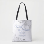 Silver Lace Dusty Blue Maid of Honor White Wedding Tote Bag<br><div class="desc">This beautiful tote bag is designed as a gift, favor, or swag bag for your wedding Maid of Honor. The simple yet elegant design features ornate silver gray lace frills in the corners with fancy dusty blue script lettering. There is space for her name, as well as the names of...</div>
