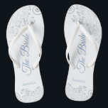 Silver Lace & Dusty Blue Script The Bride Wedding Flip Flops<br><div class="desc">Dance the night away with these beautiful wedding flip flops. Designed for the bride, they feature a simple yet elegant design with dusty blue script lettering on a white background and fancy silver gray lace curls and swirls. Beautiful way to stay fancy and appropriate while giving your feet a break...</div>