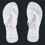 Silver Lace & Dusty Rose Script The Bride Wedding Flip Flops<br><div class="desc">Dance the night away with these beautiful wedding flip flops. Designed for the bride, they feature a simple yet elegant design with dusty rose or mauve pink script lettering on a white background and fancy silver gray lace curls and swirls. Beautiful way to stay fancy and appropriate while giving your...</div>