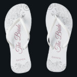 Silver Lace & Dusty Rose Script The Bride Wedding Flip Flops<br><div class="desc">Dance the night away with these beautiful wedding flip flops. Designed for the bride, they feature a simple yet elegant design with dusty rose or mauve pink script lettering on a white background and fancy silver gray lace curls and swirls. Beautiful way to stay fancy and appropriate while giving your...</div>