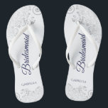 Silver Lace Navy Blue on White Bridesmaid Wedding Flip Flops<br><div class="desc">These elegant wedding flip flops are a great way to thank and recognize your bridesmaids, while giving their feet a rest after a long day. The beautiful design features an elegant design with silver gray lace frills on a white background and fancy navy blue colored script lettering. The text reads...</div>