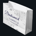 Silver Lace Navy Blue on White Bridesmaid Wedding Large Gift Bag<br><div class="desc">These beautiful gift bags are designed as a wedding gift or favor bag for your Bridesmaids. They feature a simple yet elegant design with silver faux foil lace frills and navy blue colored text reading "Bridesmaid" written in fancy script letters. There is also a place to enter her name, the...</div>