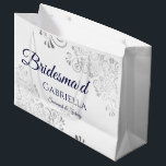 Silver Lace Navy Blue on White Bridesmaid Wedding Large Gift Bag<br><div class="desc">These beautiful gift bags are designed as a wedding gift or favor bag for your Bridesmaids. They feature a simple yet elegant design with silver faux foil lace frills and navy blue colored text reading "Bridesmaid" written in fancy script letters. There is also a place to enter her name, the...</div>
