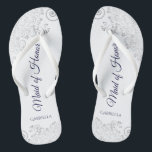 Silver Lace Navy on White Maid of Honor Wedding Flip Flops<br><div class="desc">These beautiful wedding flip flops are a great way to thank and recognize your Maid of Honor while saving her feet at the same time. Features an elegant design with silver gray lace on a white background and fancy navy blue colored script lettering. The test reads Maid of Honor with...</div>