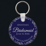 Silver Lace on Navy Blue Bridesmaid Wedding Keychain<br><div class="desc">These beautiful bridesmaid keychains are designed to be given as a gift or wedding favor. The design is simple yet elegant and features a frilly silver gray faux foil border with pale gray text on a navy blue background. There is space for her name, the wedding date and the names...</div>