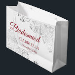 Silver Lace Red on White Bridesmaid Wedding Large Gift Bag<br><div class="desc">These beautiful gift bags are designed as a wedding gift or favor bag for your Bridesmaids. They feature a simple yet elegant design with silver faux foil lace frills and crimson red text reading "Bridesmaid" written in fancy script letters. There is also a place to enter her name, the couple's...</div>