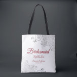 Silver Lace Red & White Bridesmaid Wedding Tote Bag<br><div class="desc">These Bridesmaid tote bags are designed as favors or gifts for wedding bridesmaids. Great swag bag to fill with favors and gifts. The simple yet elegant design features silver gray lace in the corners with fancy script lettering. There is space for her name, as well as the names of the...</div>