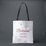 Silver Lace Red & White Bridesmaid Wedding Tote Bag<br><div class="desc">These Bridesmaid tote bags are designed as favors or gifts for wedding bridesmaids. Great swag bag to fill with favors and gifts. The simple yet elegant design features silver gray lace in the corners with fancy script lettering. There is space for her name, as well as the names of the...</div>